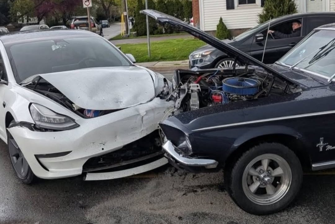 Tesla driver charged after destroying a classic Ford Mustang in a head-on crash